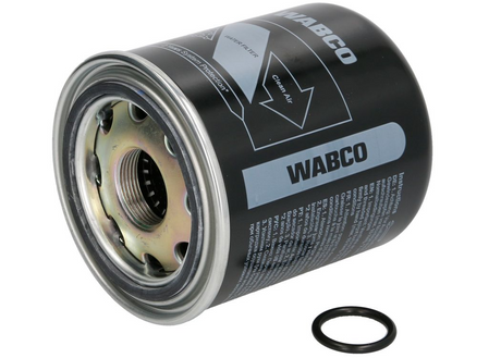 Filtro essiccatore Wabco visto di tre quarti, con base filettata e anello di tenuta visibili.